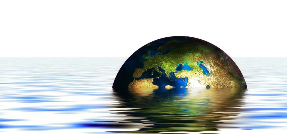 Animerad bild av havsyta där jorden bryter ytan och sticker upp halvvägs