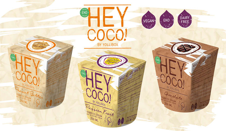 Illustrerad bild på tre pappersboxar med texten HEY COCO!